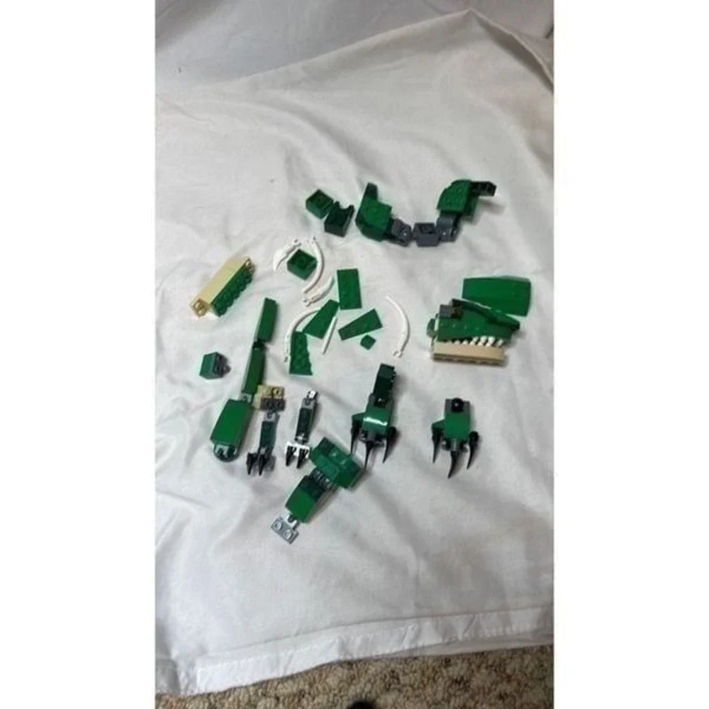 Lego Creator 3 in 1 Mighty Dinosaur Pieces.